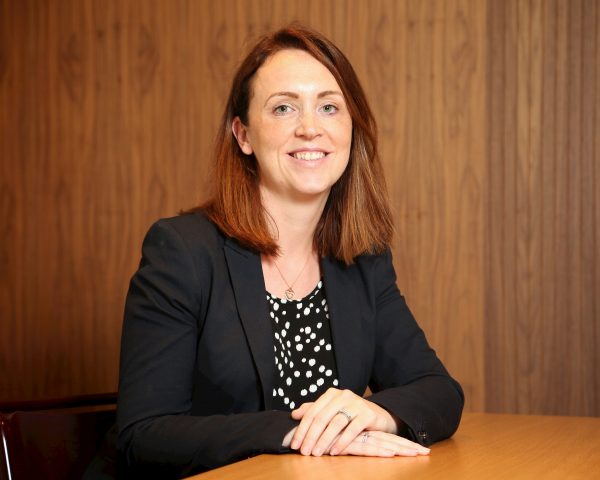 Nicola Hunter at a desk, Apem's new finance director