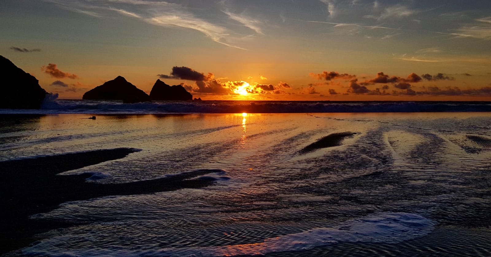 Sunset at Holywell Bay