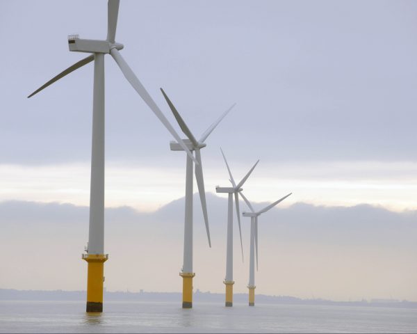 Wind turbines in the sea by Jon Parker Lee.