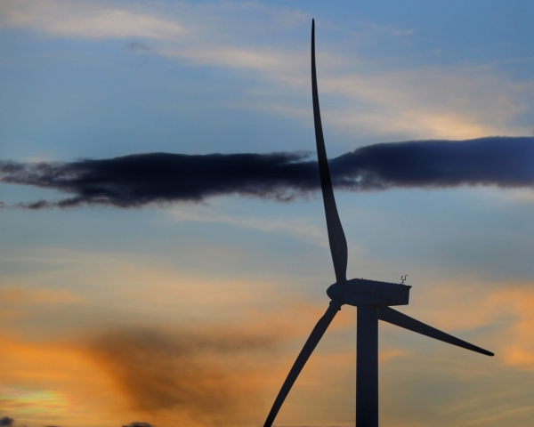Wind turbine at sunset