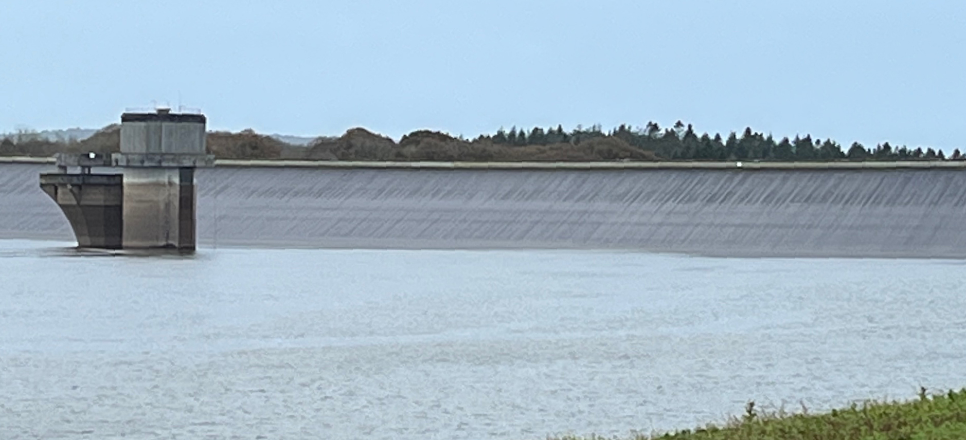 An image of a lake with a water tower showing water levels 