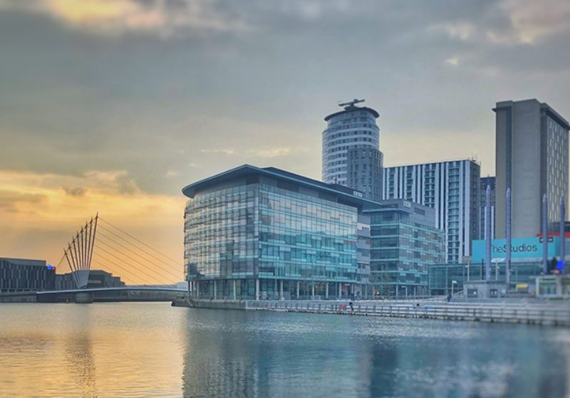 High rise modern buildings along a river