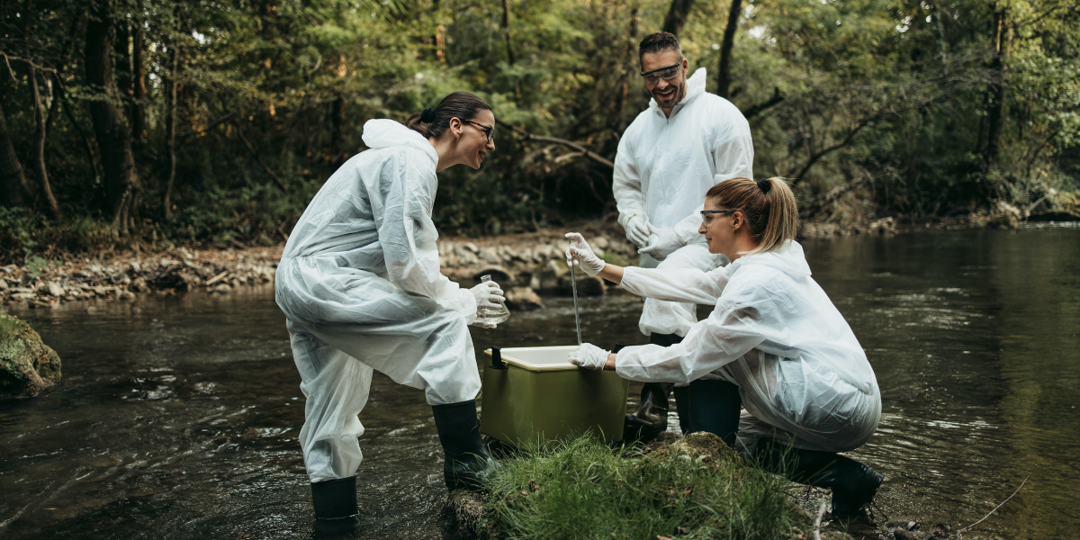 APEM GRoup - Unsplash biologists at river